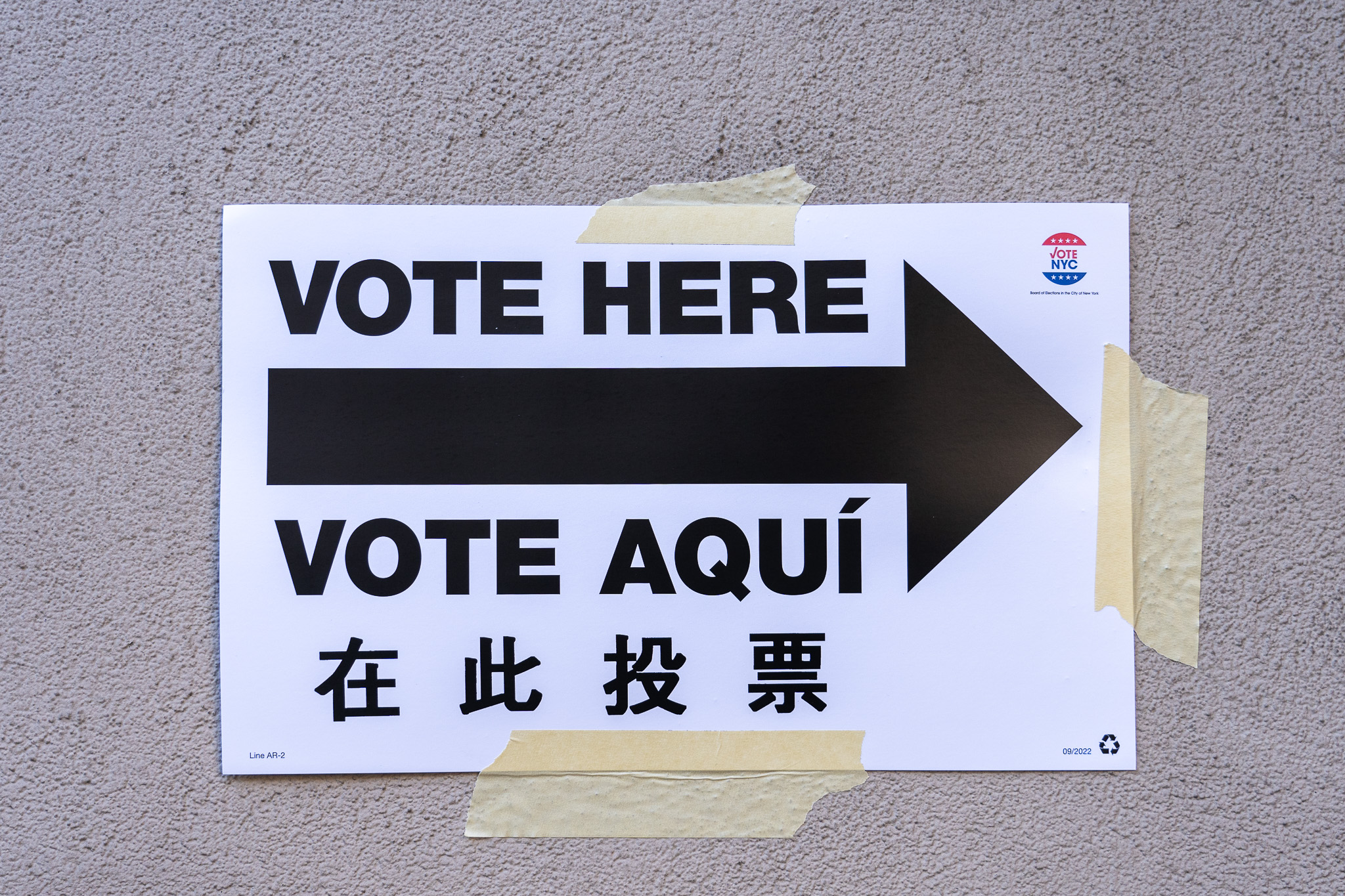 Multilingual voting sign outside Manhattan polling station